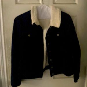 A winter jacket for the fall very soft and fluffy in the inside.